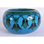 A LOVELY ART DECO FRENCH SEVRES CIRCULAR BOWL painted with stylised flowers. 12.5 cm wide.