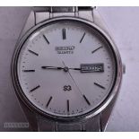 A SEIKO WRIST WATCH and strap. Untested. 3.5 cm wide. (2)