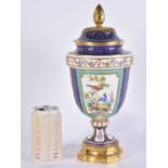 A FINE 19TH CENTURY FRENCH SEVRES PORCELAIN VASE AND COVER with gilt bronze mounts. 33 cm high.