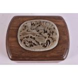 A 16TH/17TH CENTURY CHINESE RETICULATED JADE PLAQUE Ming, contained within a hardwood box,