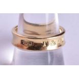 AN 18CT GOLD TIFFANY & CO RING. 8.6 grams. S 1/2.