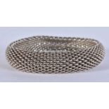 A TIFFANY & CO SILVER BRACELET. 58.3 grams. 5.75 cm internal diameter.