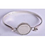 A TIFFANY & CO SILVER BANGLE. 20.3 grams. 6 cm x 4.75 cm.