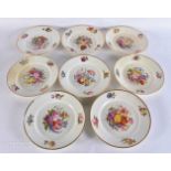 A SET OF EIGHT EARLY 19TH CENTURY DERBY PORCELAIN PLATES painted with flowers. 22.5 cm wide. (8)