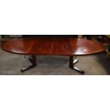 A Danish Skovbi Rosewood dining table with 2 leaf's
