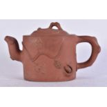 A LATE 19TH CENTURY CHINESE YIXING POTTERY TEAPOT AND COVER Late Qing. 18 cm wide.