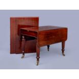 A REGENCY MAHOGANY EXTENDING DINING TABLE in the manner of Gillow, early 19th century, the rounded