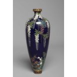 A JAPANESE MEIJI PERIOD CLOISONNE ENAMEL VASE of slender tapering cylindrical form, decorated in