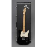 A FENDER TELECASTER ELECTRIC GUITAR, modern, with classic single cutaway body in black, with