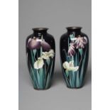 A PAIR OF JAPANESE MEIJI PERIOD CLOISONNE ENAMEL VASES of rounded form, inlaid in colours with