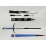 (R) DECORATIVE "SCOTTISH DIRK DAGGER" AND (R) DECORATIVE FANTASY SWORD IN BLUE SCABBARD,