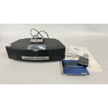 A BOSE WAVE III RADIO CD PLAYER AND REMOTE - SOLD AS SEEN.