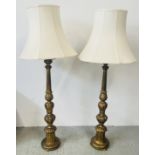 A PAIR OF GILT FINISH CARVED WOODEN LAMP STANDARDS, HEIGHT OF BASES 103CM,