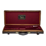 WILLIAM EVANS A BRASS-CORNERED OAK AND LEATHER DOUBLE GUNCASE, fitted for 30in. barrels, the