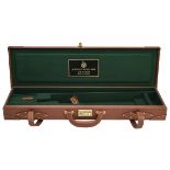 AGUIRRE Y ARANZABAL A VIRTUALLY UNUSED LEATHER SINGLE GUNCASE, fitted for 28 1/2in. barrels, the