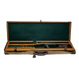 GUARDIAN A LIGHTLY USED BRASS-CORNERED OAK AND LEATHER SINGLE GUNCASE, suitable for up to 33in.