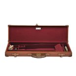BRADY A LIGHTWEIGHT TAN LEATHER SINGLE GUNCASE, fitted for 25in. barrels, the interior lined with