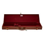 BRADY A LIGHTLY USED TAN LEATHER SINGLE GUNCASE, fitted for 30in. barrels, the interior lined with