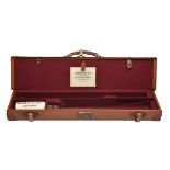 BOSS & CO. A LEATHER DOUBLE GUNCASE, fitted for 27in. barrels (could adjust to 28in.), the