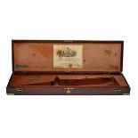 CHAS. LANCASTER A BRASS-CORNERED OAK SINGLE PERCUSSION GUNCASE, fitted for 30in. barrels, pigskin