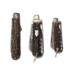 THREE LATE 19th CENTURY SPORTSMAN'S POCKET KNIVES, A multi-tool with 2 3/4in. and 1 3/4in. blades,