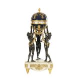 A 19TH CENTURY FRENCH PATINATED BRONZE, ORMOLU AND WHITE MARBLE ‘CERCLES TOURNANTS’ FIGURAL MANTEL C