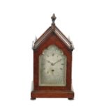 G.SEAILE, LONDON, A LATE REGENCY ROSEWOOD VENEERED GOTHIC STYLE ENGLISH FUSEE MANTLE CLOCK