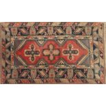 A 20TH CENTURY DOSEMEALTI TURKISH RUG