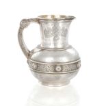 A VICTORIAN SILVER WATER JUG OF EASTERN DESIGN