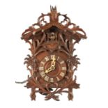 A RARE MINIATURE BLACK FOREST JOCLE CUCKOO CLOCK