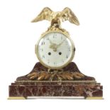A 19TH CENTURY FRENCH ORMOLU AND VEINED MARBLE MANTEL CLOCK