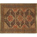 AN ANTIQUE TRIBAL QASHQAI RUG