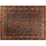 A LATE 19TH CENTURY PERSIAN TRIBAL RUG