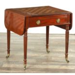 A GOOD REGENCY FIGURED MAHOGANY GAMES TABLE IN THE MANNER OF GILLOWS OF LANCASTER