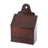 AN 18TH CENTURY OAK WALL MOUNTED CANDLE BOX