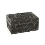 A 19TH CENTURY CARVED EBONY CEYLONESE BOX
