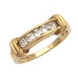 A 9CT YELLOW GOLD AND DIAMOND RING