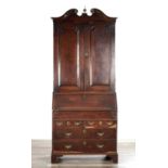 AN EARLY 18TH CENTURY OAK BUREAU BOOKCASE