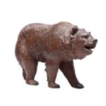 A LATE 19TH CENTURY CARVED BLACK FOREST BEAR