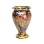 AN EARLY 20TH CENTURY WEDGWOOD FAIRYLAND LUSTRE VASE IN THE IMPS ON A BRIDGE PATTERN Z5481