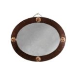 ATT. LIBERTY & CO. AN ARTS AND CRAFTS COPPER OVAL MIRROR