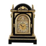 PB BRADFORD, LONDON, A LARGE LATE 19TH CENTURY ORMOLU MOUNTED EBONISED QUARTER CHIMING BRACKET CLOCK