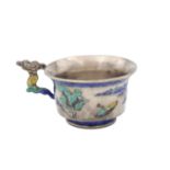 A CHINESE SILVER AND ENAMEL HANDLED CUP