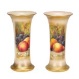 A PAIR OF EARLY 20TH CENTURY ROYAL WORCESTER PORCELAIN FRUIT-PAINTED SPILL VASES BY RICKETTS