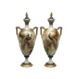 A PAIR OF LATE 19TH CENTURY ROYAL WORCESTER PORCELAIN PEACOCK VASES AND COVERS