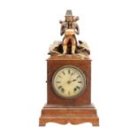 A RARE 19TH CENTURY BLACK FOREST FIGURED WALNUT AUTOMATON "DUMPLING EATER" MANTEL CLOCK