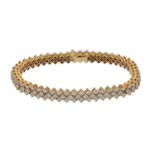 AN 18CT YELLOW GOLD AND DIAMOND DOUBLE ROW BRACELET