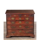 AN UNUSUAL GEORGE II MAHOGANY SMALL CHEST OF DRAWERS