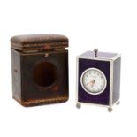 A FINE ART DECO CARTIER MINUTE REPEATING SILVER AND GUILLOCHE ENAMEL DESK CLOCK