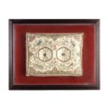 A 17TH CENTURY EMBROIDERED CUSHION